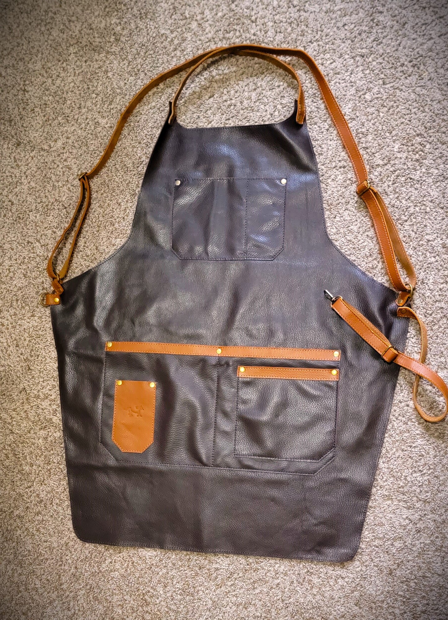 Leather premium apron, black and brown colours.
