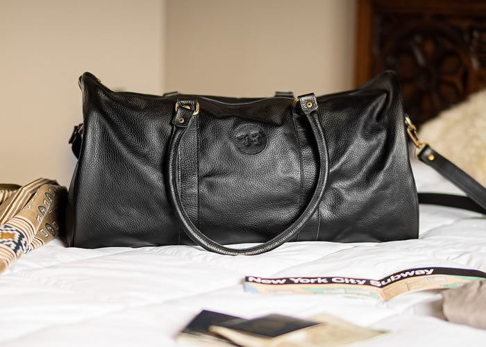 Large full leather travel bag.