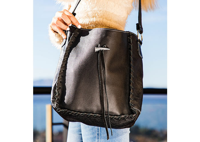 Black leather handbag.