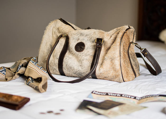 Small Cowhide travel bag.