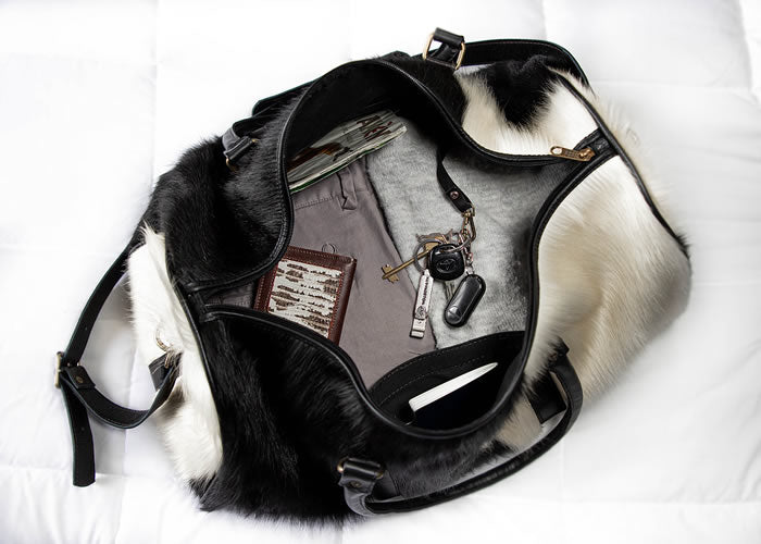 Small Cowhide travel bag.