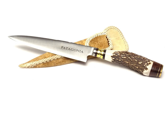 Deer Stag horn knife with bronze detail and rawhide case 5.5 inch / 14 cm.