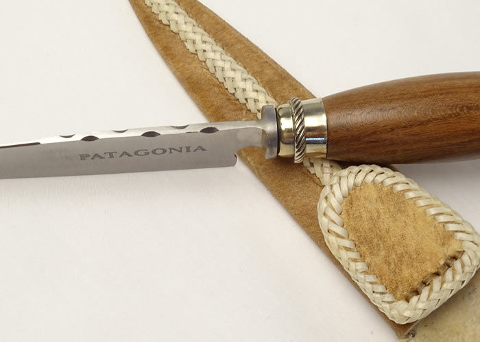 Sculpted knife with Alpaca and rawhide case.