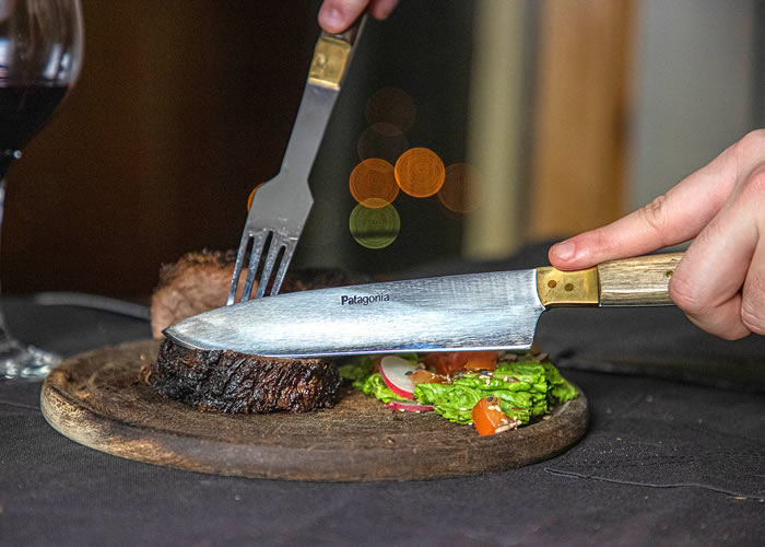 Small knife and fork set with wooden handle.