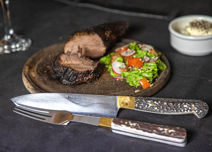 Small knife and fork set with stag horn handle.