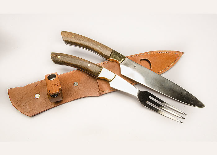 Large knife and fork set with wooden handle.