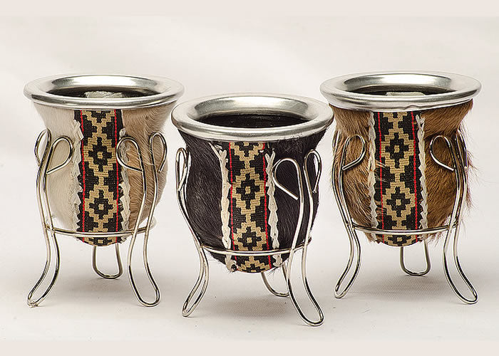 Cowhide mate with wire frame and glass interior.