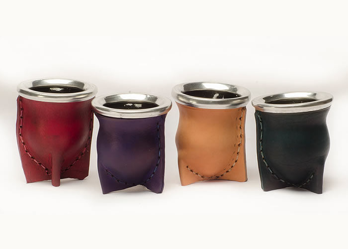 Full grain cowhide mate with glass interior.