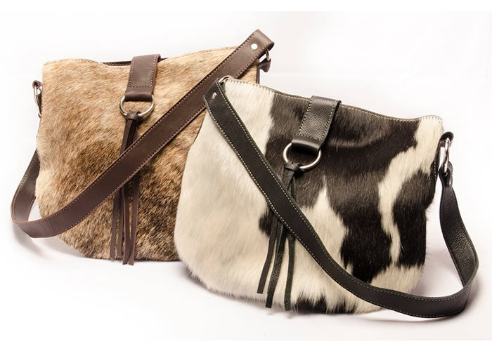 Cowhide leather handbag with fringes.