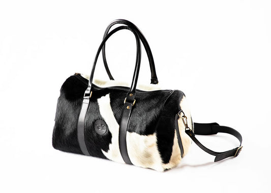 Small Cowhide travel bag.