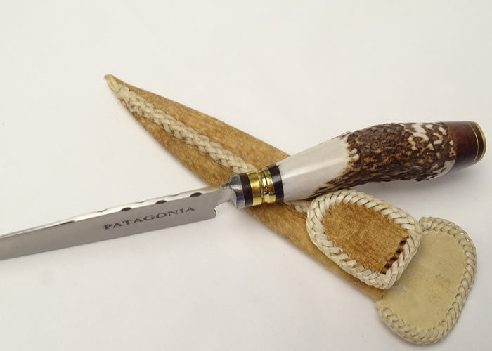 Deer Stag horn knife with bronze detail and rawhide case 5.5 inch / 14 cm.