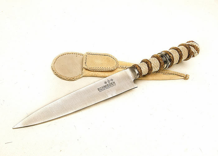 Hand woven knife with “Alpaca ring”.