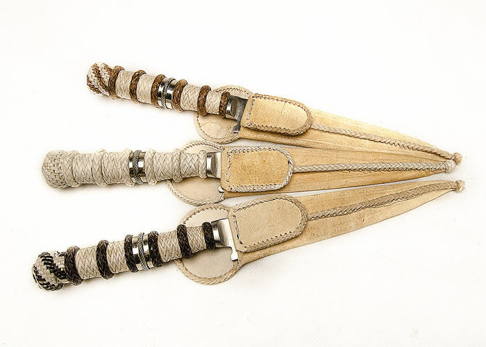 Hand woven knife with “Alpaca ring”.