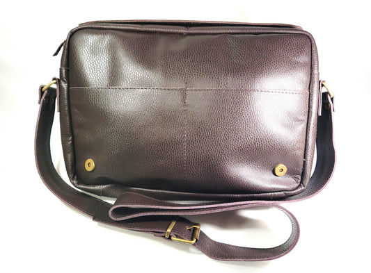 Large laptop brown or black leather bag.